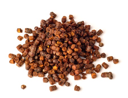 Granules of bee bread isolated on a white background. Apitherapy. Beekeeping products. Strengthening immunity.の写真素材