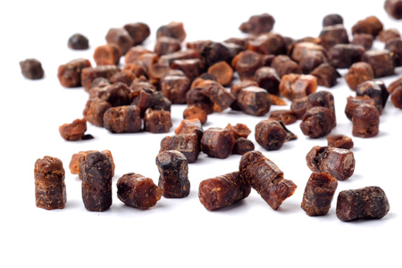 Granules of bee bread isolated on a white background. Apitherapy. Beekeeping products. Strengthening immunity.の写真素材
