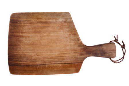 Old wooden cutting board on a white background.の写真素材
