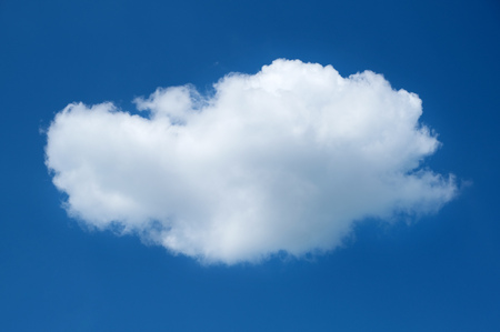White cloud on blue sky. The concept of cloud technologies.の写真素材
