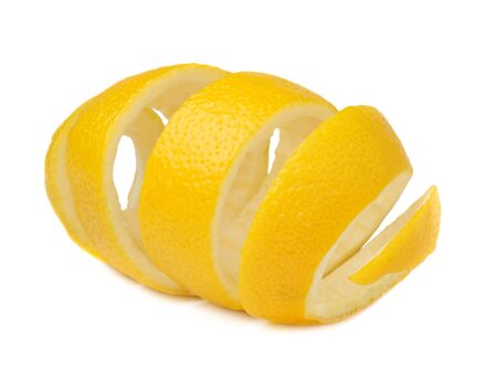 Lemon peel isolated on a white background. Use of lemon peel in cooking and medicineの写真素材