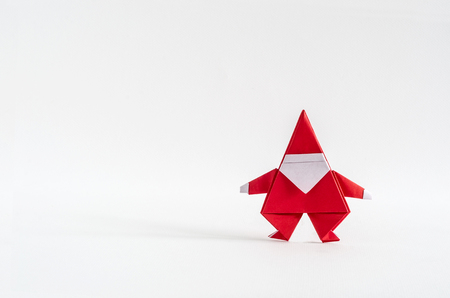 Santa Claus paper craft on white background. Paper origami.の写真素材