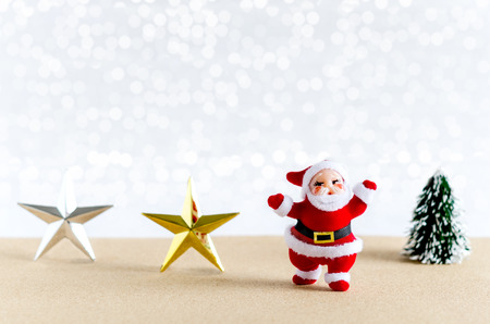 Christmas background. Santa Claus, star, christmas tree with lights snow winter background.の写真素材