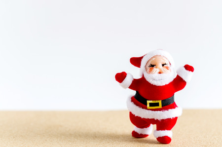 Christmas background. Santa Claus on table with white background.の写真素材