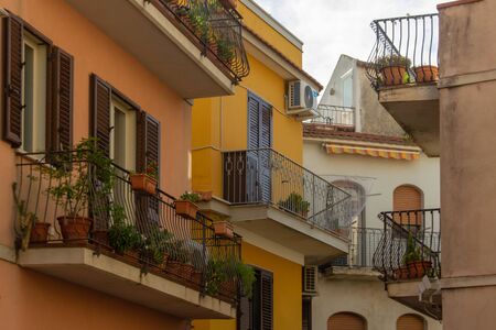 Italian streets. Houses with balconies. Sicily Italyの写真素材