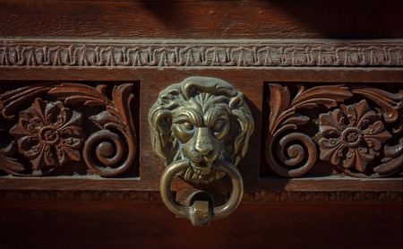 Door knocker in the shape of lion headの写真素材