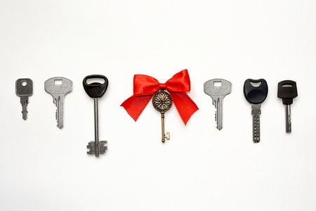 One special key with a red bow among the others