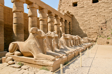 Ancient ruins of Karnak temple in Egypt. Avenue of the ram-headed Sphinxes.の写真素材