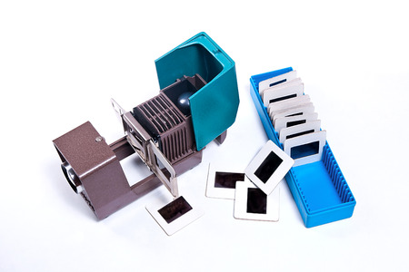 Vintage filmstrip projector on the white background. Old projector for displaying of slides.の写真素材