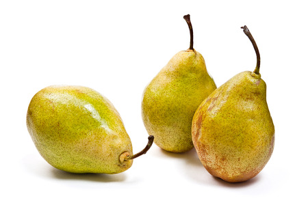 Three fresh green pears. Group of juicy ripe fruits.の写真素材