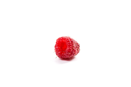 Close up view of fresh raspberries fruits isolated on white background