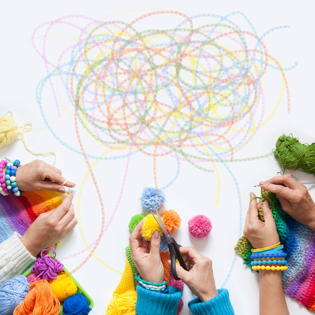 The women knit and crochet colored fabric. View from above.の写真素材
