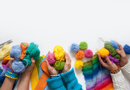 The women knit and crochet colored fabric. View from above.の写真素材