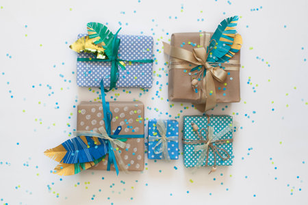 Gifts wrapped in kraft paper. View from above.の写真素材