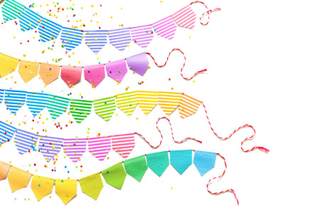 Colored flags garland. The background is white wood. celebration