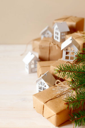 Christmas gifts with snowflakes. Small white houses. Walnuts.の写真素材