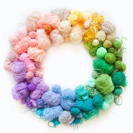 Colored balls of yarn. View from above. Rainbow colors. All colors. Yarn for knitting. Skeins of...
