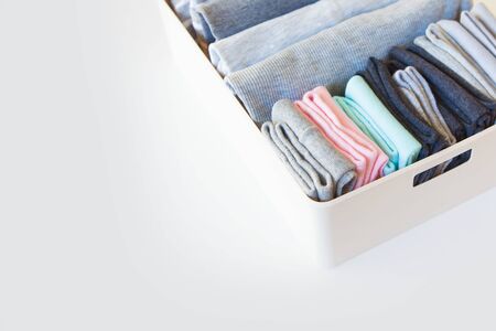 Order in wardrobe. Clothing neatly foldedの写真素材