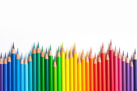 Crayons - colored pencil set loosely arranged on white background. colored pencils are not arranged exactly in a row.の写真素材