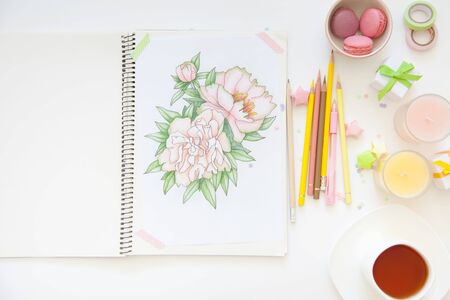 concept of women's hobbies and leisure. drawing with simple colored pencilsの写真素材