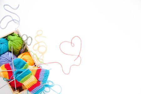 Colored balls of yarn. View from above. Rainbow colors. All colors. Yarn for knitting. Skeins of...