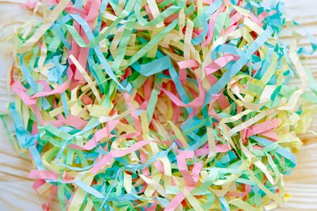 Finely and finely chopped colored paper. Bird nest for Easter. Paper strips.の写真素材