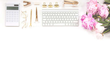 Office supplies are gold and white. Concept female desktop.