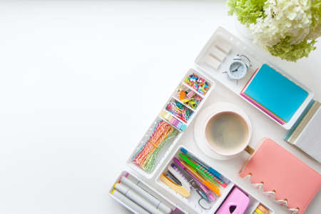 School supplies. Stylish stationery in pastel color. Flat lay, top view. White background.の写真素材