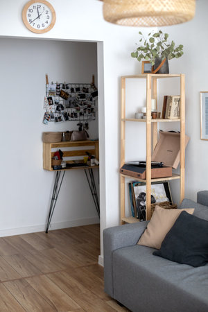 Cosiness living room apartment with hygge furniture decoration elegance detailsの写真素材