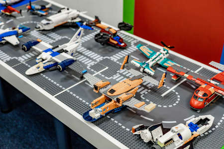 Lots of toy planes and helicopters built from lego blocks.のeditorial素材