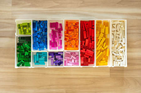 Khabarovsk, Russia, February 25, 2022. Top view multicolored Lego Classic details sorting by colorsのeditorial素材
