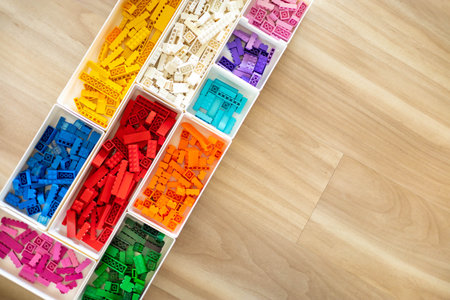 Khabarovsk, Russia, February 25, 2022. Top view multicolored Lego Classic details sorting by colorsのeditorial素材