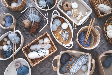 Many baskets made of natural eco-friendly materials. Yarn for knitting, knitting needlesの写真素材