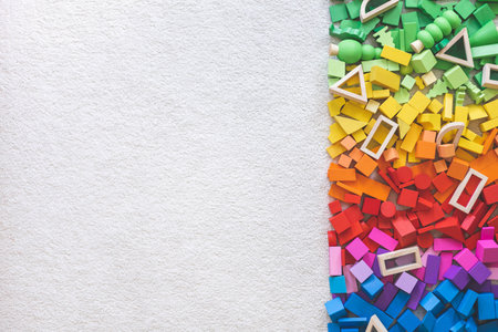 Rainbow spectrum Montessori material wooden bricks row imagination seamless pattern backgroundの写真素材