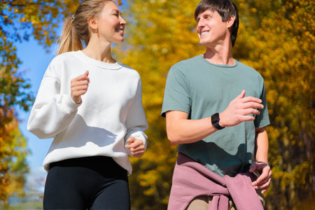 Full body profile couple young two friends strong athletic sportswoman athlete woman man 30 yearsの写真素材