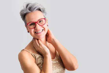 Closeup portrait of gorgeous happy middle aged mature woman, senior older 50 year ladyの写真素材