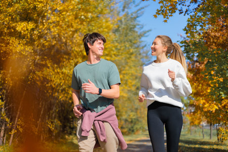 Full body profile couple young two friends athletic sportswoman athlete woman man 30 years oldの写真素材