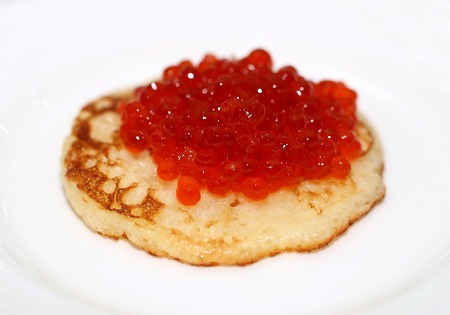 Pancake with red caviarの写真素材