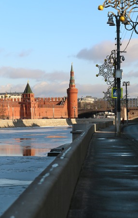 Moscow Kremlin in winter photographed on a background of the Moskva River covered with iceの写真素材