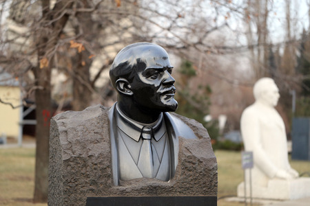 bust of Vladimir Lenin in the park is photographed close-up