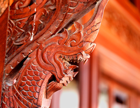 Red dragon decoration at a Buddhist temple in Ayutthaya in Thailandの写真素材
