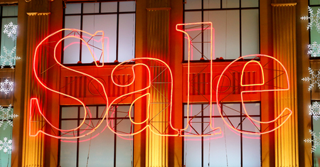 The inscription sale on the building photographed closeupの写真素材