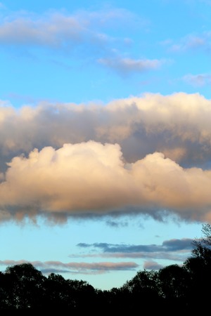 Beautiful clouds photographed on the background of blue sky