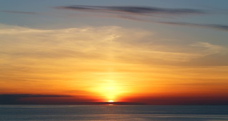 Beautiful sea sunset with bright tropical sun to photograph closeup