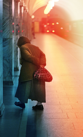 Old age. Old Grandmother is in the Moscow metroの写真素材
