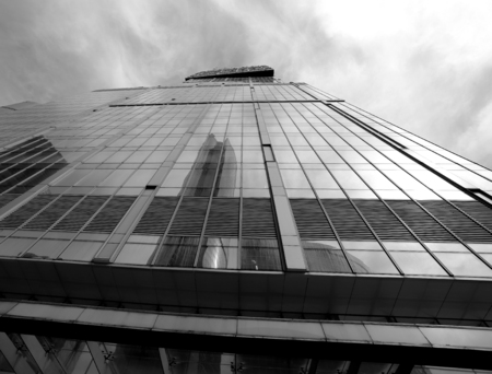 Photo of a modern bright tower of a skyscraper