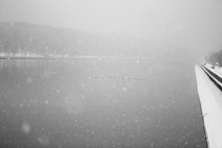 snowfall on the riverの写真素材