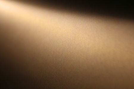 The metal in the sunlight texture is photographed in close-upの写真素材