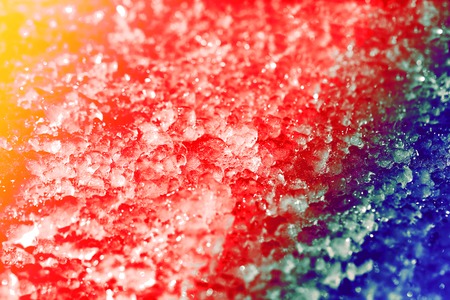 Beautiful abstrakt color snow texture photographed close up