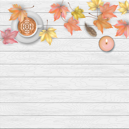 Autumn leaves top view on a wooden backgroundの写真素材